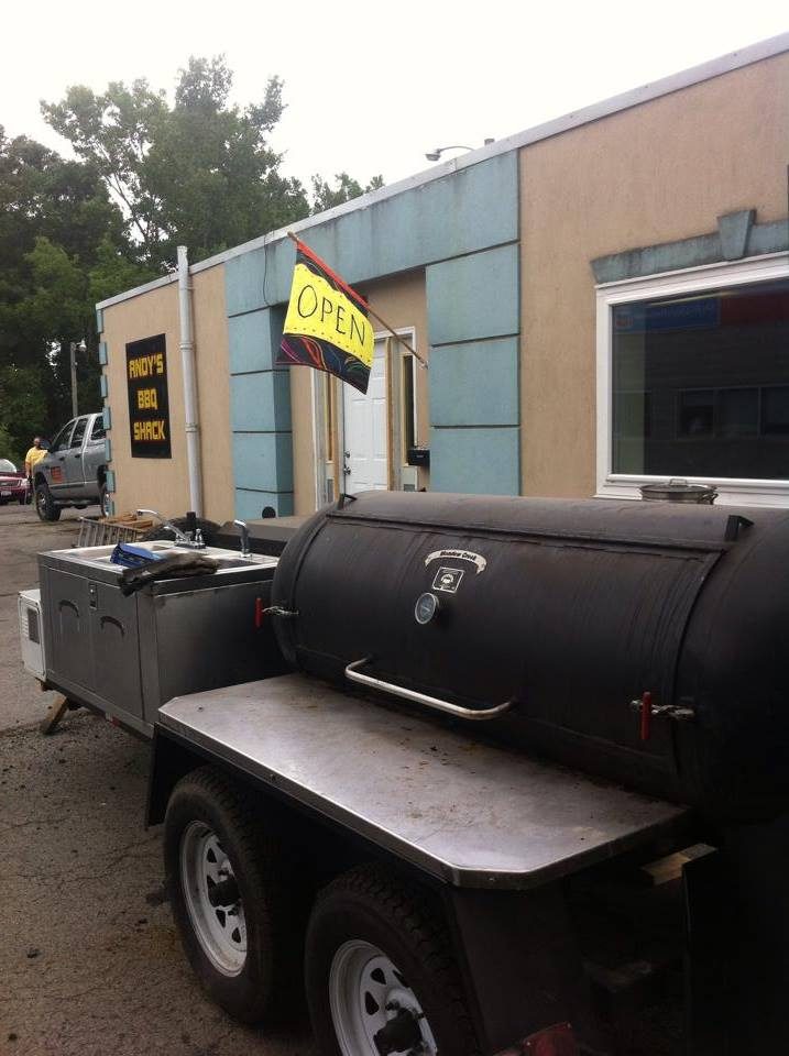 The shack in the early days with the Andy's BBQ Shack sign and the smoker trailer parked out front